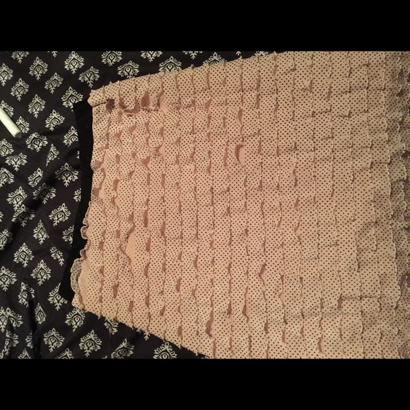 Super cute salmon pink and black polka dot skirt.
