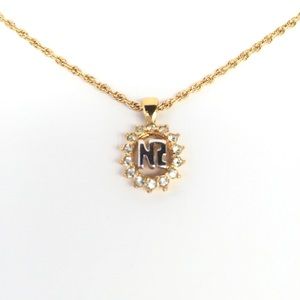 Nina Ricci gold color rhinestone necklace.