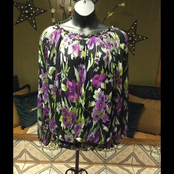 Colorful sheer purple and green top.