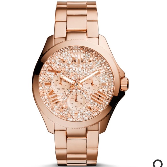 Rose gold fossil watch studded out.