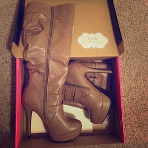 Knee high heeled boots