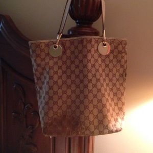 Authentic Gucci tote been loved please see photos