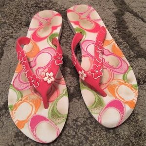 COACH coral flip flops