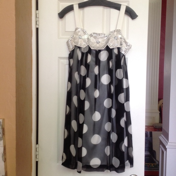Black and white polka dot dress with beading.