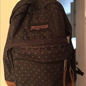 Jansport grey polka dot backpack