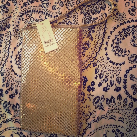 Gold sequin clutch bag