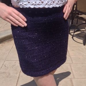 A beutiful shimmer navy mini skirt never been used