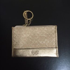 Gold COACH coin wallet