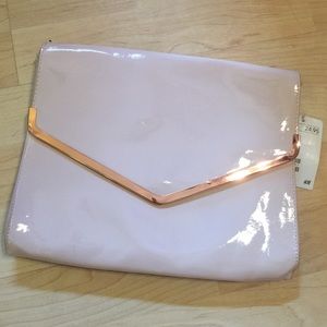 Light pink clutch bag