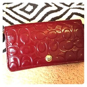 Beautiful dark red Coach wristlet!✨