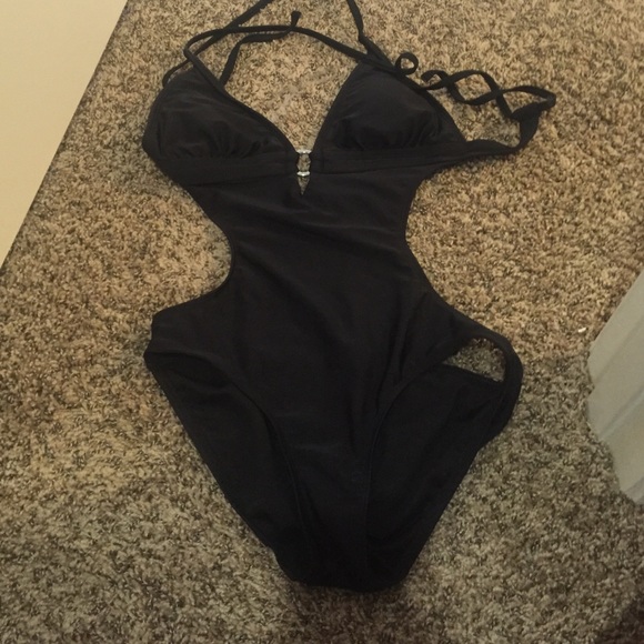 Black once piece. OP brand