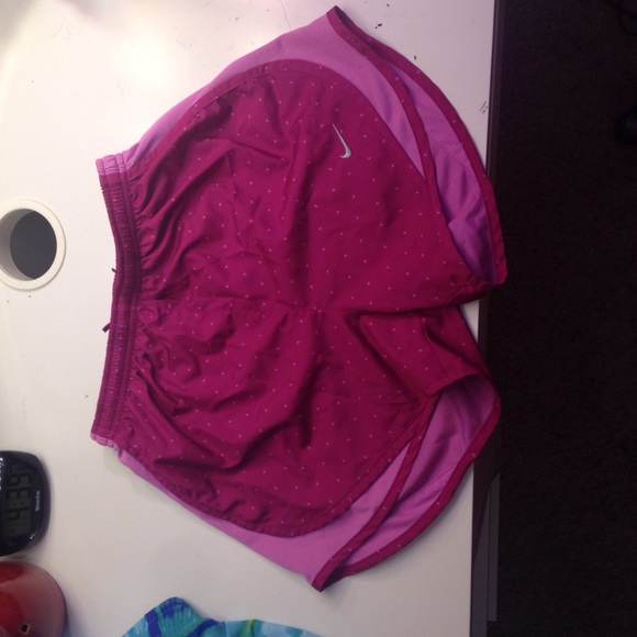 Pink dotted Nike shorts.