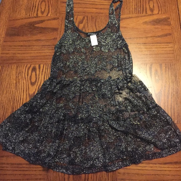 Over lay top. Super cute with tank and leggings.