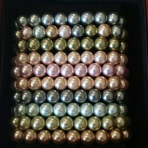 Set of 10 simulated pearl bracelets
