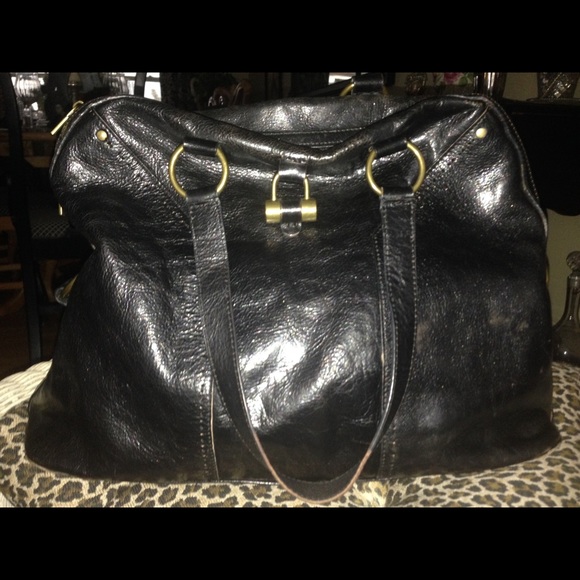 Yves St. Laurent black leather handbag.