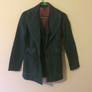 A green two piece coat with matching vest