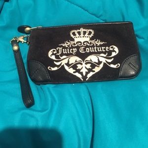 Small, black Juicy™ clutch with strap