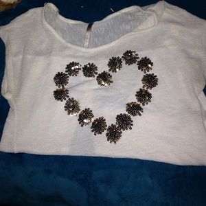 Flowered shirt open from the back