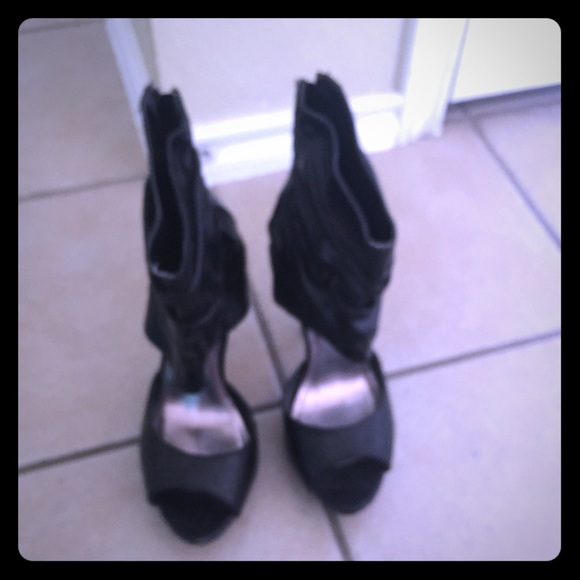 Black Dollhouse heels/booties. Never worn