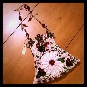 Elegant sequin and bead pouch handbag