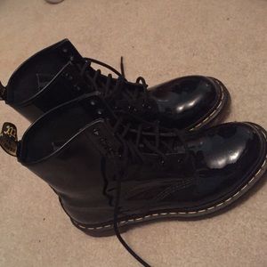 Shiny black doc marten