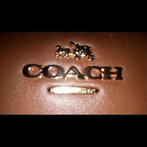 COACH wristlet 🎉priced to sell🎉🎉🎉