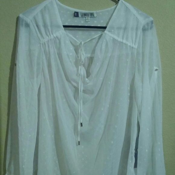 Jennifer Lopez long sleeve white top