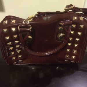 Maroon patent leather purse