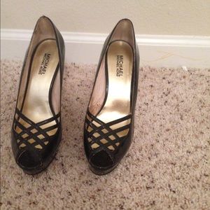 Black leather crisscross and gold detail heels