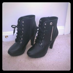 Black High Heeled Boots by Jennifer Lopez