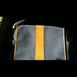 Navy blue AUTHENTICATE COACH messenger bag
