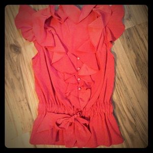 Ruffled, button, and tie shirt. Super cute.