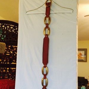 Brown leather and gold colored belt