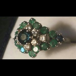 14 kt white gold diamond  and emerald ring