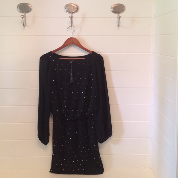 Cocktail dress with sheer sleeves. - Picture 1 of 3