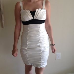 Ruby dress cream and black clam shell dress