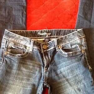 Amethyst dark denim jeans with minor distress