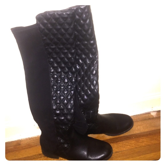 Tall black boots
