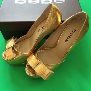 Bebe gold platforms