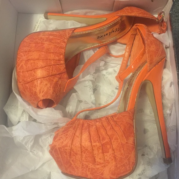Orange t-strap heels