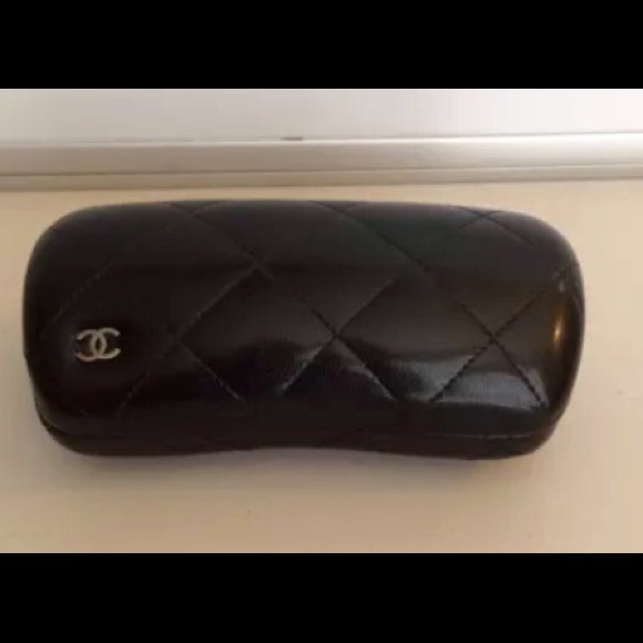 Authentic Chanel quilted sunglass case in black.