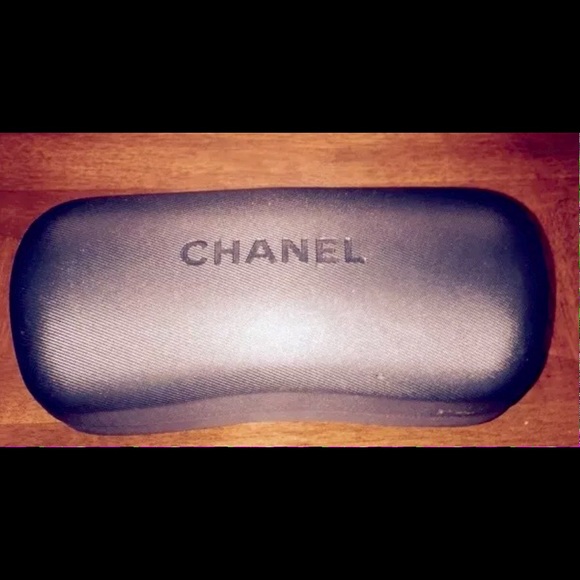 Authentic Chanel hard sunglass case in black.
