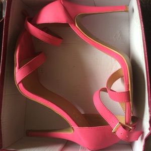 Hot pink open toed sandal heels.