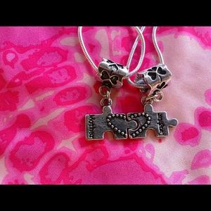 Mother and daughter puzzle necklaces