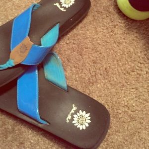 Yellow box flip flops