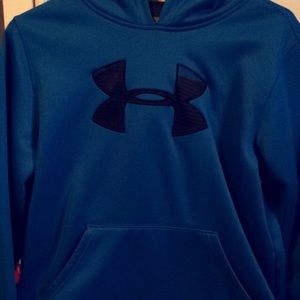 A blue under armor sweatshirt