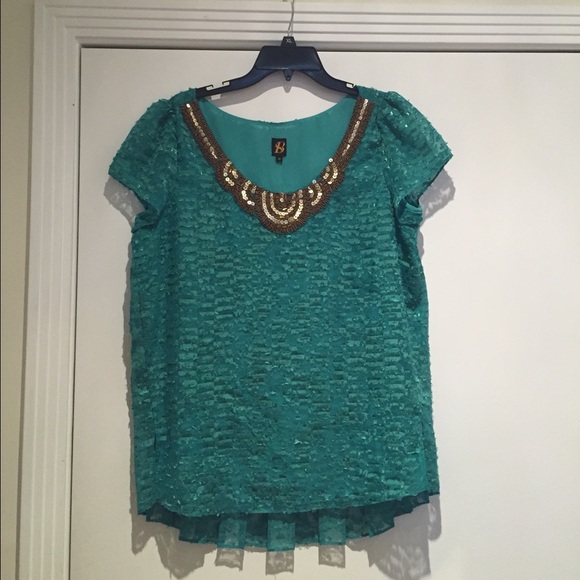 Green Anthropologie top with gold beaded details