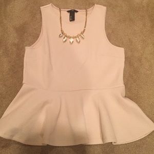 Light pink peplum top from H&M. NWT.