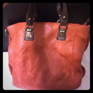 Miztique rust orange purse