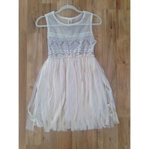 Cute flapper style white dress with lace.